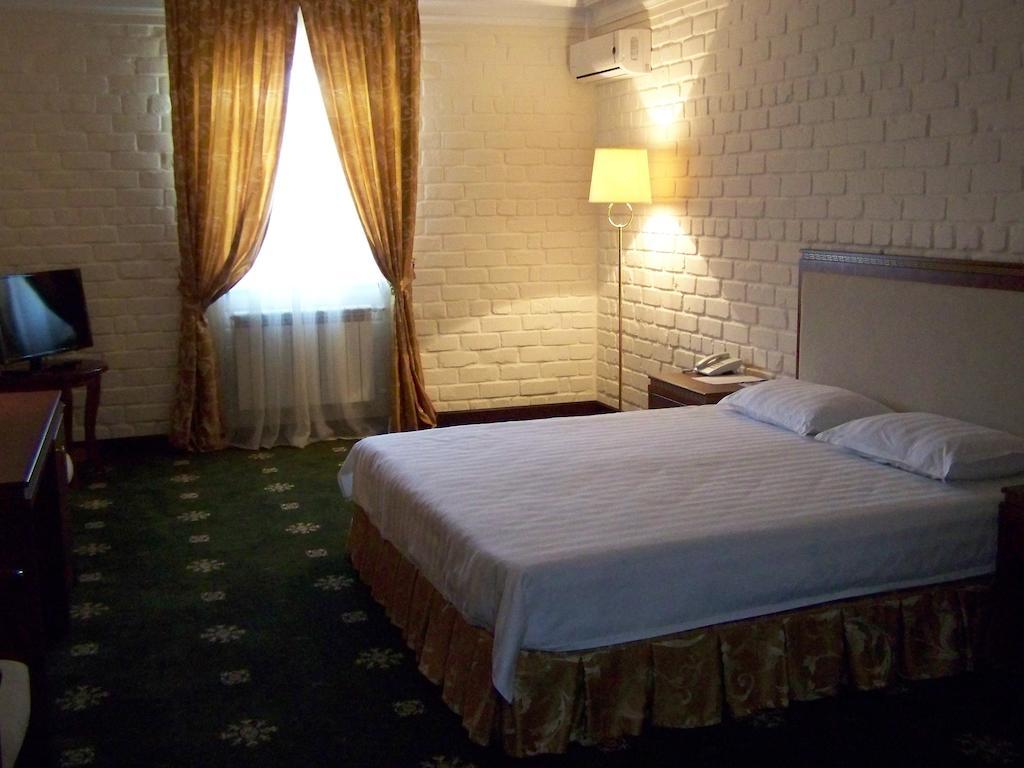 Arien Plaza Hotel Tasjkent Kamer foto